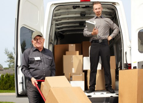 Removal van in Hackney moving household items