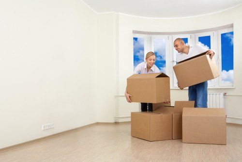 Boxes and small furniture prepared for a local Hackney student move
