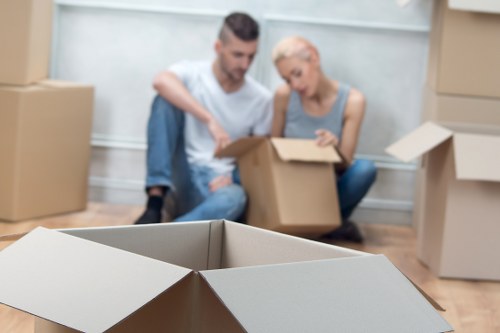 Local removal crew handling fragile and bulky items during a Hackney move
