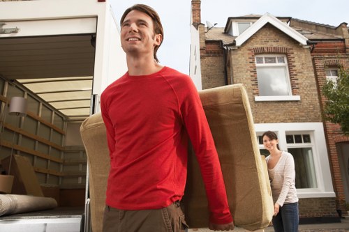Removal van servicing a Hackney residential street