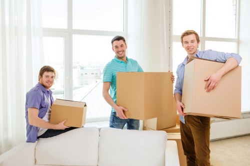 Insured Hackney removal van service handling belongings carefully