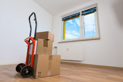 Office furniture and equipment being prepared for a business move